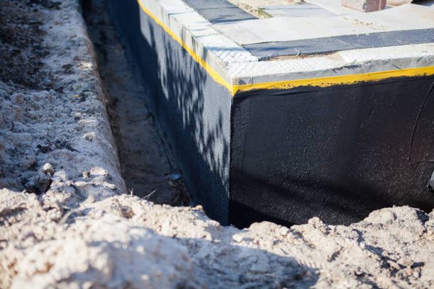 Professional Waterproofing technician working in Mitchells, VA